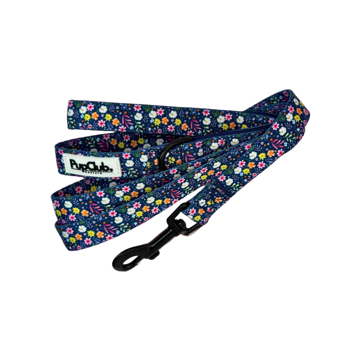 Deep blue dog lead with a pink, white, yellow and orange flower print, black swivel clip and black D ring